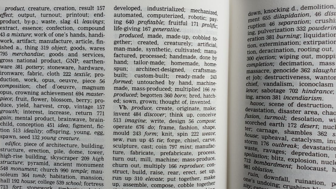 A photo of portions of two pages in a thesaurus, centered on synonyms for the word 'created'